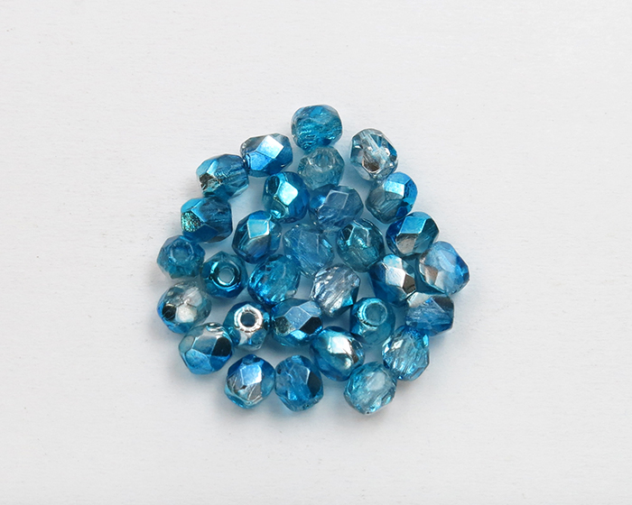 FP03_00030/15218 Firepolish 3mm Coated - Capri Silver 1/2 Facetovane staklene perle